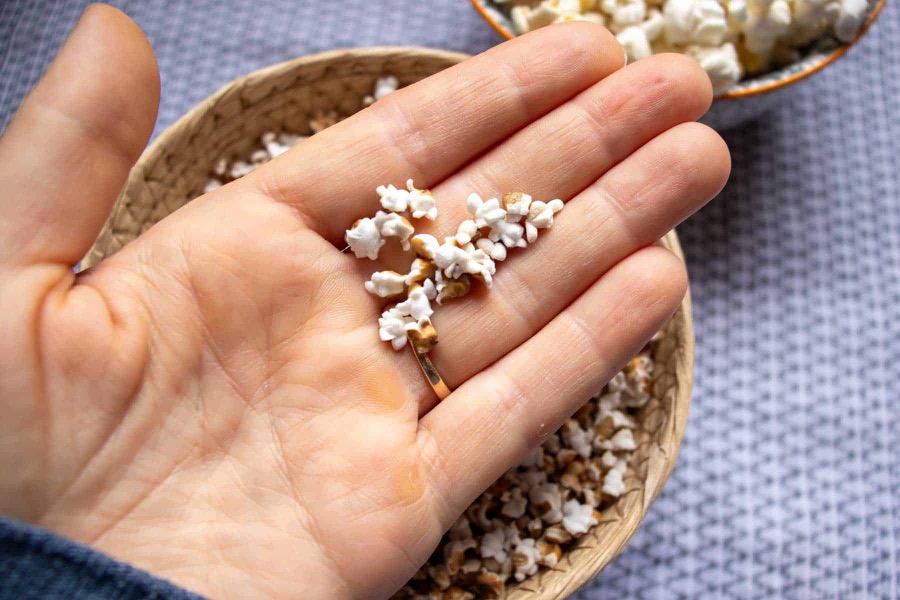 A handful of popped sorghum